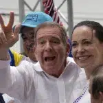 Far-right opposition candidate Edmundo González Urrutia (left) and far-right politician María Corina Machado at the opening of their electoral campaign, July 4, 2024. Photo: Ariana Cubillos/AP.