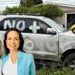 Photo composition showing one of María Corina Machado's campaign SUVs allegedly vandalized, with a photo (bottom lower corner) of Machado (right) next to Magalli Meda, and a miniature campaign photo of far-right candidate Edmundo González in a yellow Volkswagen Beetle going downhill. Photo: Orinoco Tribune.
