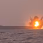 A screengrab from a video posted earlier by the Yemeni Military Media depicting the moment the Transworld Navigator ship was hit with a USV. Photo: YAF Military Media.