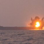 A screengrab from a video posted earlier by the Yemeni Military Media depicting the moment the Transworld Navigator ship was hit with a USV. Photo: YAF Military Media.