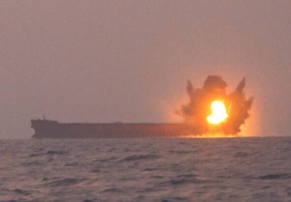 A screengrab from a video posted earlier by the Yemeni Military Media depicting the moment the Transworld Navigator ship was hit with a USV. Photo: YAF Military Media.