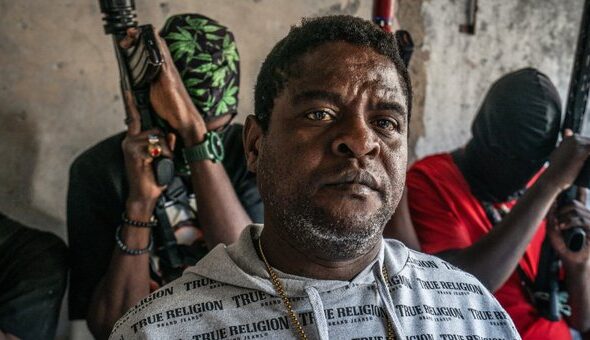 Jimmy “Barbeque” Chérizier with fighters from the G9 family. Photo: X/@peacelily1121.