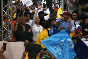 María Corina Machado waves while campaigning for her surrogate, Edmundo González Urrutia, in Maracaibo, Venezuela, May 2, 2024. Photo: Humberto Matheus/Shutterstock.