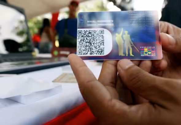 A person holding a Patria Card. File photo.