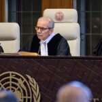Presiding ICJ Judge Nawaf Salam reads the ruling in the International Court of Justice, or World Court, The Hague, Netherlands, July 19, 2024, as the United Nations top court is delivering a non-binding advisory opinion. Photo: AP.