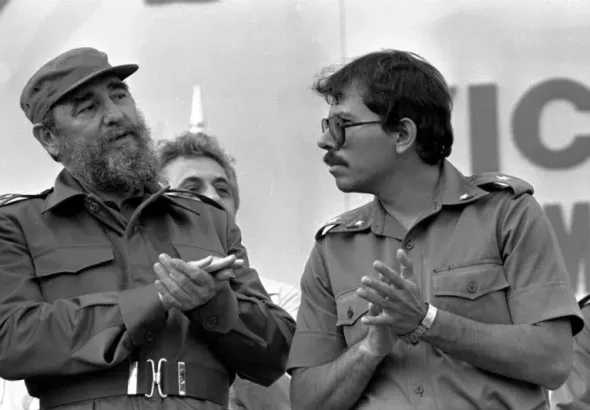 Fidel Castro (left) with Daniel Ortega (right). Photo: AP.