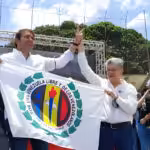 Carlos Prosperi with Henry Ramos Allup, leader of Democratic Action party, during an opposition primaries campaign rally in 2023. File photo.
