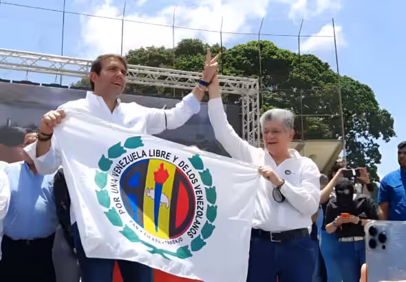 Carlos Prosperi with Henry Ramos Allup, leader of Democratic Action party, during an opposition primaries campaign rally in 2023. File photo.