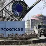 An armored vehicle leaves the territory of the Zaporozhye Nuclear Power Plant (ZNPP), accompanying the motorcade with IAEA Director General Raphael Grossi. Photo: Konstantin Mihalchevskiy/Sputnik/file photo.