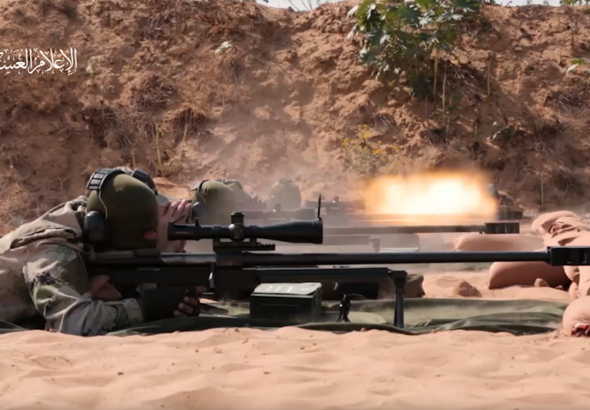 Al-Qassam snipers shoot their Al-Ghoul sniper rifles at a shooting range, as part of a promotional video for the Palestinian resistance-made rifles. Photo: Al-Qassam Brigades/Military Media.