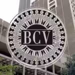Headquarters of the Central Bank of Venezuela, with the BCV logo in the foreground. File photo.