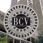 Headquarters of the Central Bank of Venezuela, with the BCV logo in the foreground. File photo.