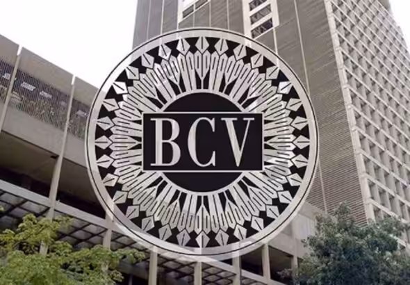 Headquarters of the Central Bank of Venezuela, with the BCV logo in the foreground. File photo.