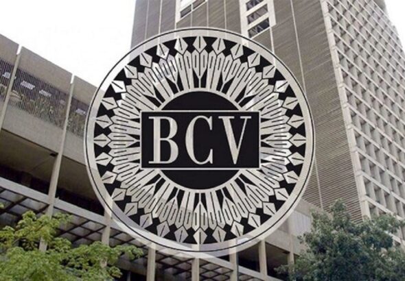 Headquarters of the Central Bank of Venezuela, with the BCV logo in the foreground. File photo.