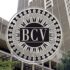 Headquarters of the Central Bank of Venezuela, with the BCV logo in the foreground. File photo.