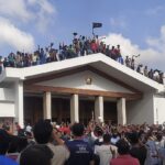 People rallying in front of the prime minister's office after Sheikh Hasina's resignation. Photo: Md Joni Hossain/Wikimedia Commons.