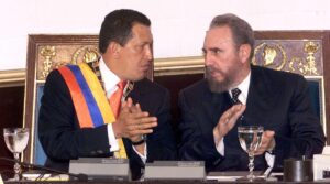 Cuban President Fidel Castro (right) and Venezuelan President Hugo Chávez (left) during the Cuban leader's state visit to Venezuela, October 27, 2000. Photo: Juan Barreto/AFP via Getty Images.