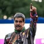 Venezuela's President Nicolás Maduro raises his hand during a rally with supporters in Caracas in 2019. Photo: Alfredo Lasry/Getty Images/file photo.
