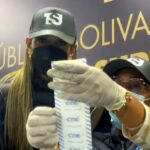 Venezuela's Supreme Court President Caryslia Beatriz Rodríguez (left) checking a voting record with another TSJ official. Photo: RedRadioVE.
