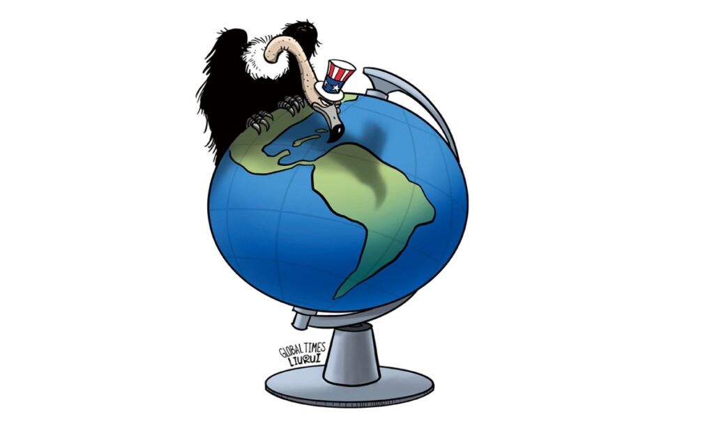 Cartoon showing a vulture with a US hat sitting over the globe and picking at South America. File photo.