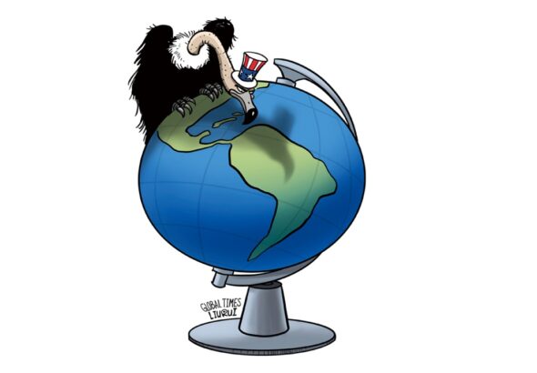 Cartoon showing a vulture with a US hat sitting over the globe and picking at South America. File photo.