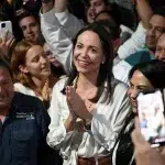 Venezuelan extreme-right politician María Corina Machado among supporters. Photo: AFP.