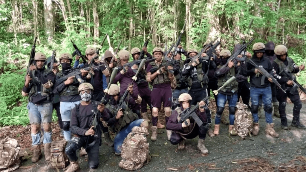 Members of the criminal gang Tren de Aragua pose in an undated video. File photo.