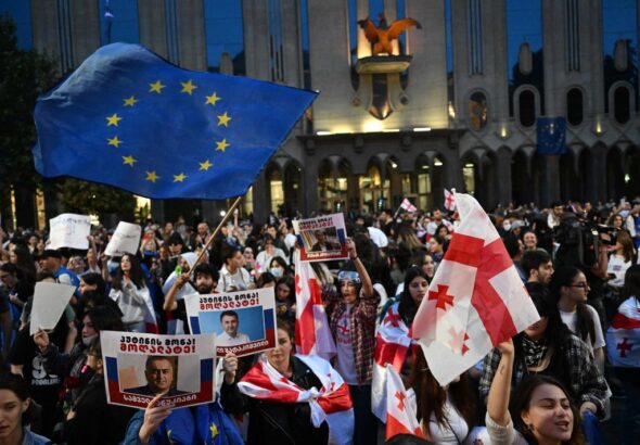 Demonstrators rally outside the Georgian parliament. Photo: Vano Shlamov/AFP/file photo.