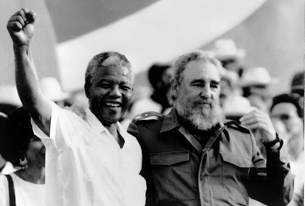 Cuban President Fidel Castro (right) and African leader Nelson Mandela (left) gesture during the celebration of the "Day of the Revolution" in Matanzas Saturday, July 27, 1991. Photo: Alejandro Balaguer/AP/file photo.