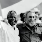 Cuban President Fidel Castro (right) and African leader Nelson Mandela (left) gesture during the celebration of the "Day of the Revolution" in Matanzas Saturday, July 27, 1991. Photo: Alejandro Balaguer/AP/file photo.