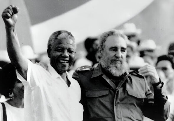 Cuban President Fidel Castro (right) and African leader Nelson Mandela (left) gesture during the celebration of the "Day of the Revolution" in Matanzas Saturday, July 27, 1991. Photo: Alejandro Balaguer/AP/file photo.