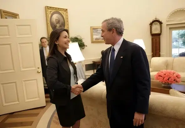 President George W. Bush welcomes Venezuelan opposition politician Maria Corina Machado to the Oval Office. Tuesday, May 31, 2005. Photo: Eric Draper/White House/file photo.