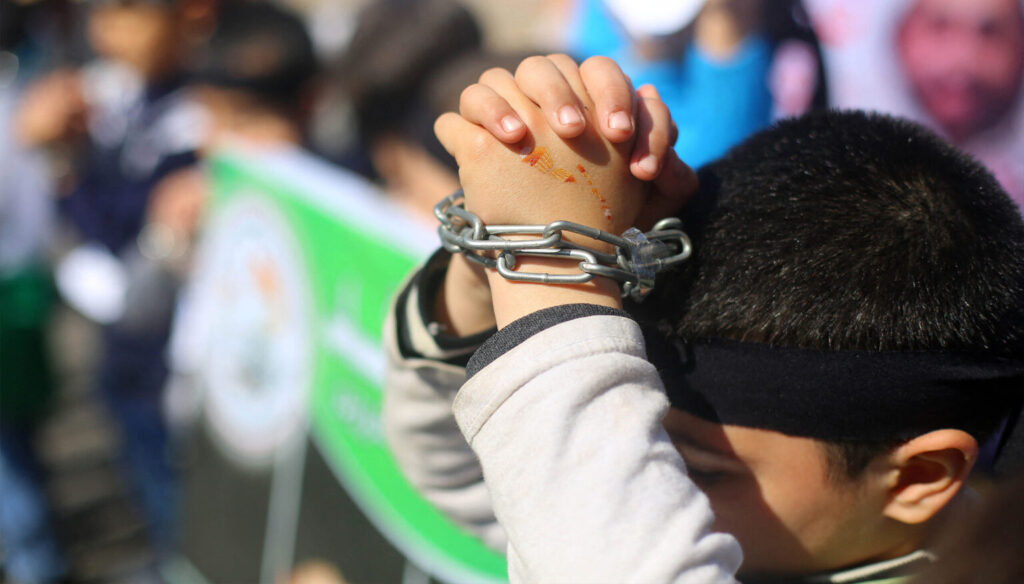 A demonstration demanding the release of Palestinian prisoners, Gaza, 2016. Photo: Magdy Fathi/AFP.