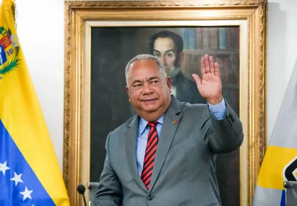 Venezuela’s National Electoral Council President Elvis Amoroso waves to the press in Caracas, Venezuela, Tuesday, March 5, 2024. Photo: Ariana Cubillos/AP/file photo.