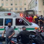 People gathered outside the American University of Beirut Hospital after several people wounded by handheld pagers in Beirut Lebanon on September 17, 2024. Photo: AP.
