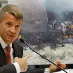Erik Prince, founder of the mercenary group Blackwater, testifies in the US Congress about the group's involvement in war crimes in Iraq. Photo: Getty Images.