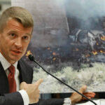 Erik Prince, founder of the mercenary group Blackwater, testifies in the US Congress about the group's involvement in war crimes in Iraq. Photo: Getty Images.