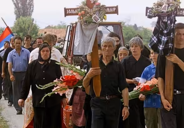 Kosovo Serbs in the village of Gracka e Vjeter/Staro Gracko hold the annual wheat harvest to mourn their relatives murdered by Kosovo Liberation Army terrorists during the wheat harvest season in July 1999. Photo: The Srpska Times.