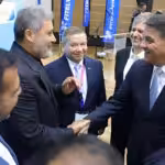 Iranian Ambassador to Venezuela Hojjatolah Soltani (left) shakes hands with Venezuelan Public Works Minister Jorge Márquez (right) at FITELVEN 2024, Caracas, September 21, 2024. Photo: Prensa Corpoelec.