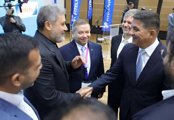 Iranian Ambassador to Venezuela Hojjatolah Soltani (left) shakes hands with Venezuelan Public Works Minister Jorge Márquez (right) at FITELVEN 2024, Caracas, September 21, 2024. Photo: Prensa Corpoelec.