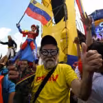 Supporters of Venezuelan President Nicolás Maduro hold figures of Maduro, Hugo Chávez, and Simón Bolívar during the victory march after President Maduro's re-election, August 3, 2024. Photo: Maxwell Briceño/Reuters.
