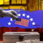 Election box where a US flag is cast as a ballot. Photo: Ali Al-Hadi Chemis/Al Mayadeen.