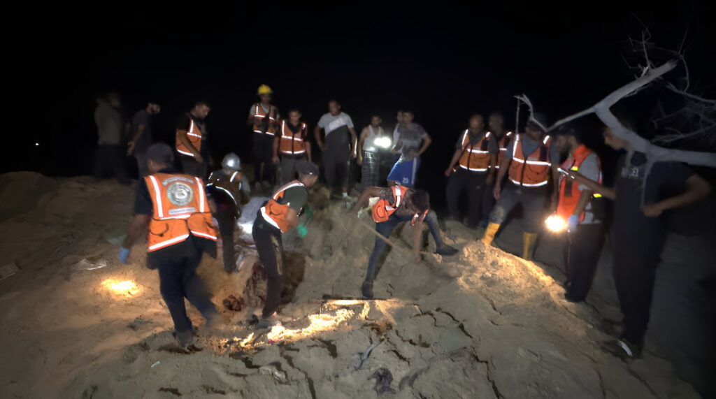 Palestinian search and rescue workers scouring the al-Mawasi refugee camp in the city of Khan Younis in southern Gaza Strip on September 10, 2024 after a new Israeli strike. Photo: PressTV.