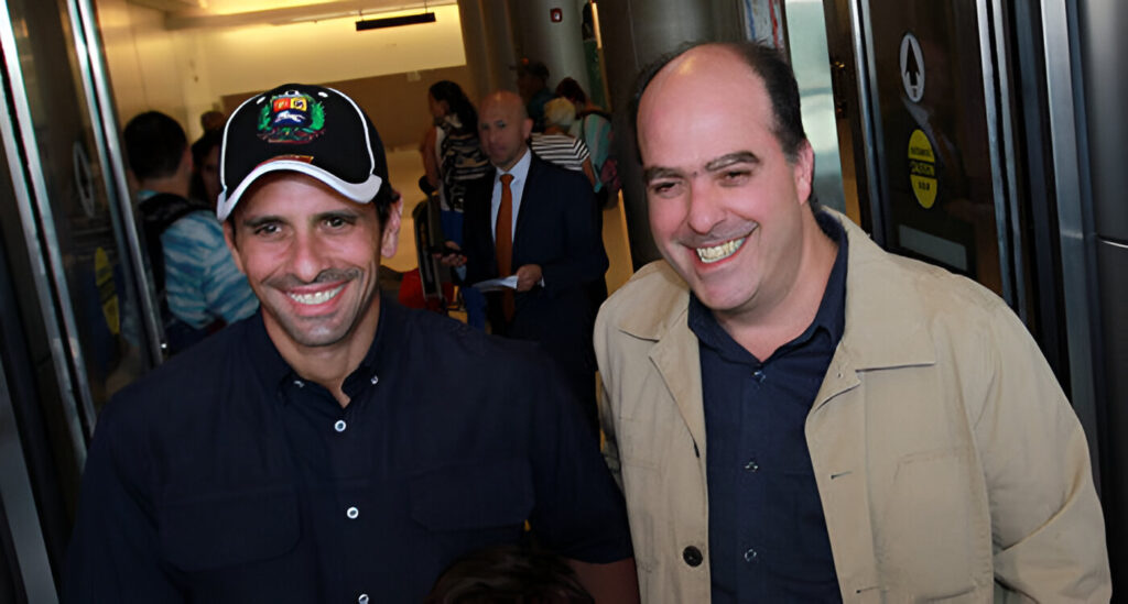 Henrique Capriles (left) and Julio Borges (right) during a public event in 2013. File photo.