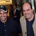 Henrique Capriles (left) and Julio Borges (right) during a public event in 2013. File photo.