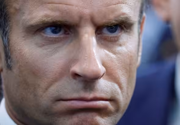 French President Emmanuel Macron looks on as he visits the Eurosatory land and airland defense and security trade fair, in Villepinte, north of Paris, June 13, 2022. Photo: Ludovic Marin/AP Photo.