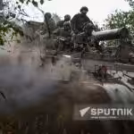 Russian artillery servicemen ride a self-propelled heavy mortar in the course of Russia's military operation in Ukraine, in Russia. Photo: Sergey Bobylev/Sputnik.