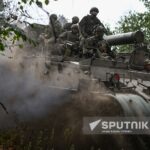 Russian artillery servicemen ride a self-propelled heavy mortar in the course of Russia's military operation in Ukraine, in Russia. Photo: Sergey Bobylev/Sputnik.