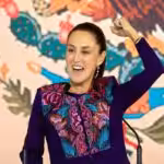 Claudia Sheinbaum raises her fist in celebration. Photo: CNN.