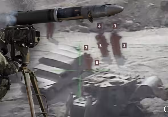 An anti-tank guided missile (ATGM) system over a photo of a Zionist convoy under fire. Photo: The Cradle.